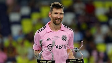 NASHVILLE, TENNESSEE - AUGUST 19: Lionel Messi #10 of Inter Miami poses with his Best Player Award and Top Scorer Award after defeating the Nashville SC to win the Leagues Cup 2023 final match between Inter Miami CF and Nashville SC at GEODIS Park on August 19, 2023 in Nashville, Tennessee.   Kevin C. Cox/Getty Images/AFP (Photo by Kevin C. Cox / GETTY IMAGES NORTH AMERICA / Getty Images via AFP)